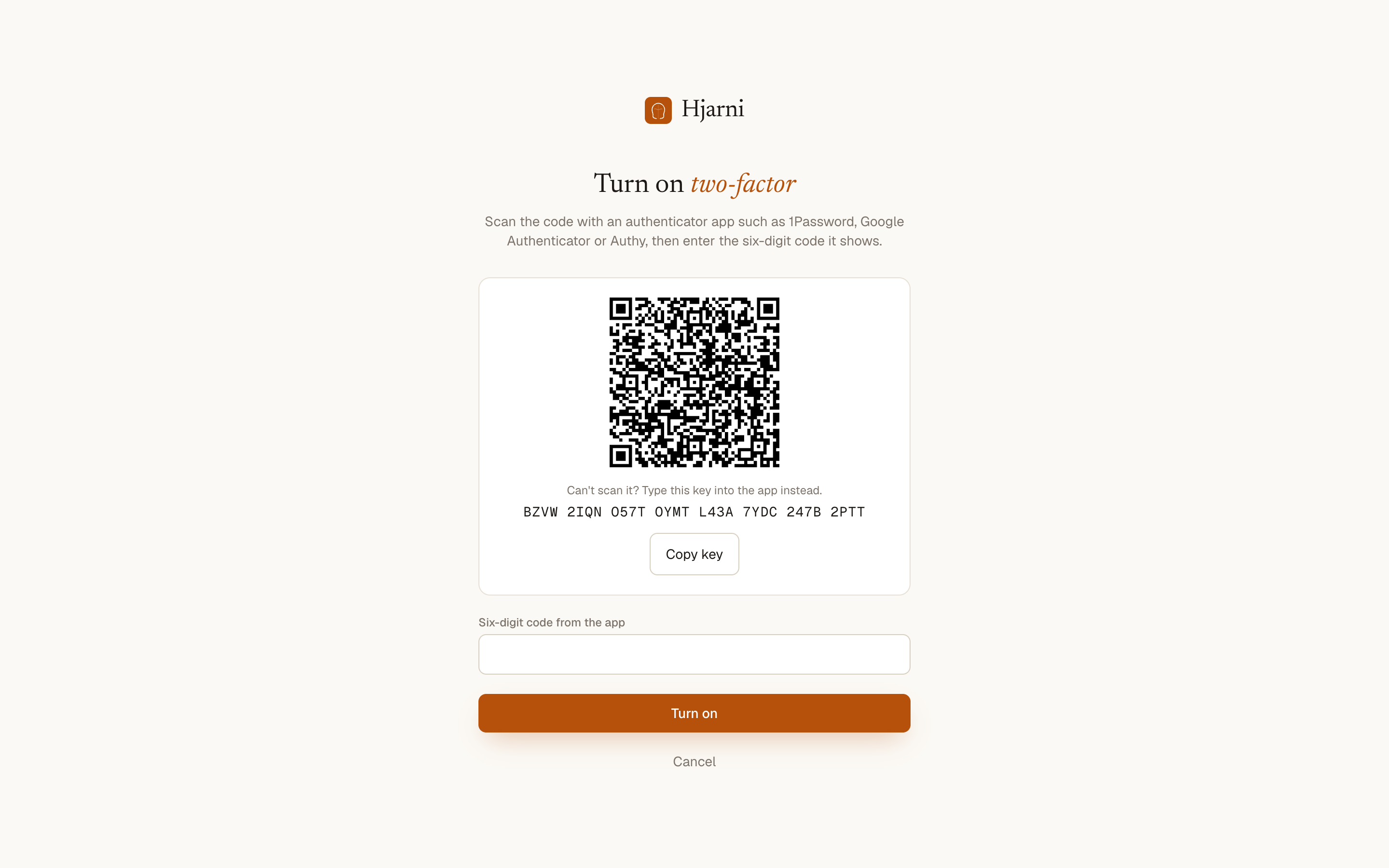 The Turn on two-factor page in Hjarni: a QR code to scan, the setup key typed out underneath for apps that cannot scan, and a field for the six-digit code.